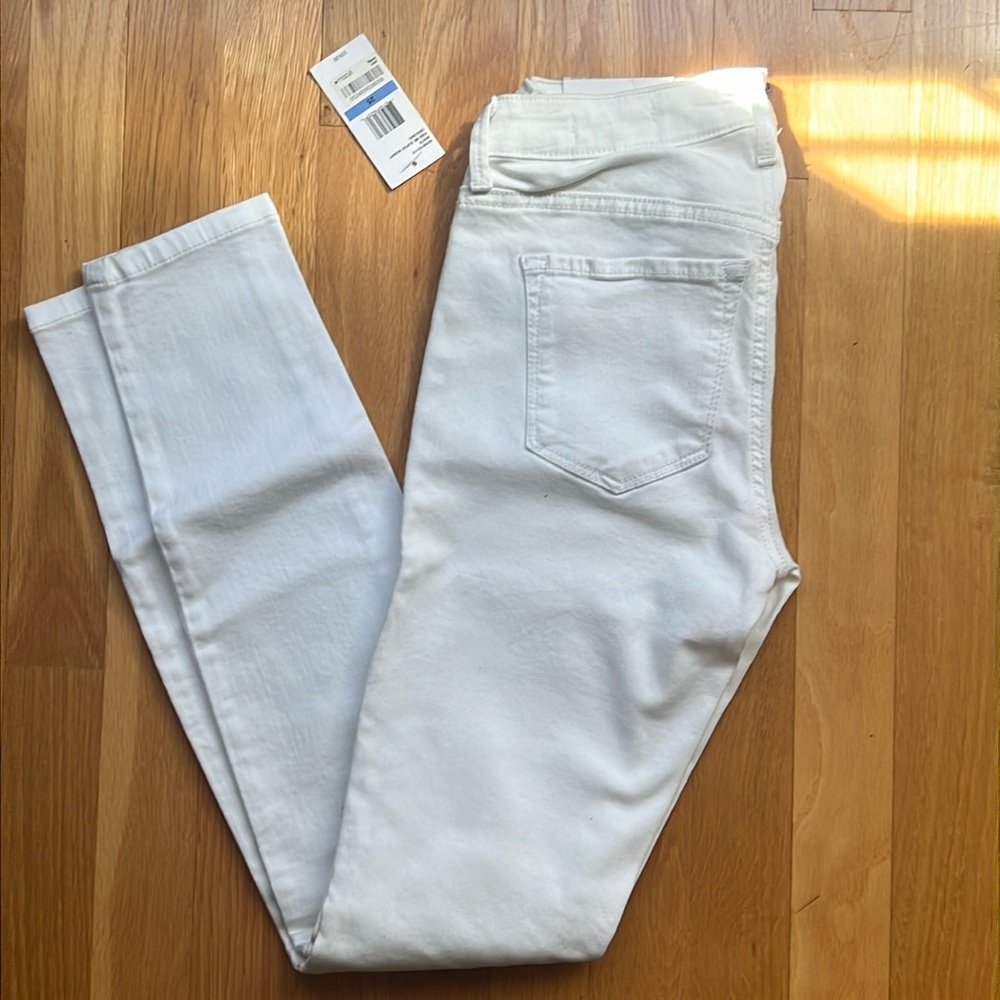 Brand new with tags Jessica Simpson skinny white denim jeans, size 25